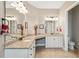 Beautiful bathroom featuring granite countertop, dual sinks, and vanity with decorative lighting for a luxurious experience at 516 Tidewater Chase Ln, Summerville, SC 29486