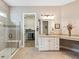 Modern bathroom with glass-enclosed shower, and separate access to a walk-in closet for ultimate convenience at 516 Tidewater Chase Ln, Summerville, SC 29486