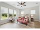 Serene bedroom with natural light, vintage furniture, and hardwood floors creating a relaxing atmosphere at 516 Tidewater Chase Ln, Summerville, SC 29486