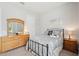 Cozy bedroom featuring a metal frame bed and light colored walls and floors at 516 Tidewater Chase Ln, Summerville, SC 29486