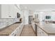 Gourmet kitchen boasts granite countertops, stainless appliances, and custom cabinets at 516 Tidewater Chase Ln, Summerville, SC 29486