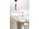 Elegant pendant lights provide ample illumination in the home's interior at 516 Tidewater Chase Ln, Summerville, SC 29486