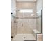 Bathroom showing tiled shower with glass enclosure and bench seat at 516 Tidewater Chase Ln, Summerville, SC 29486