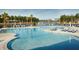 Gorgeous outdoor pool with lounge chairs and a view of the lake at 516 Tidewater Chase Ln, Summerville, SC 29486