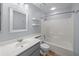 Bright bathroom with sleek vanity, modern fixtures, tub and shower at 5488 Altamaha Dr, North Charleston, SC 29420