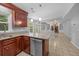 Gourmet kitchen featuring granite countertops, stainless appliances, and open concept design, perfect for entertaining at 5488 Altamaha Dr, North Charleston, SC 29420