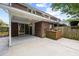 A covered patio extends from a brick home into the backyard at 655 Swinton Ct, Mount Pleasant, SC 29464