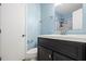 Cozy bathroom featuring a black vanity, white countertop, chrome fixtures, and a white toilet at 655 Swinton Ct, Mount Pleasant, SC 29464