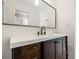 Close up of new bathroom vanity with a white counter and black faucet at 655 Swinton Ct, Mount Pleasant, SC 29464
