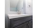 Close up view of vanity with grey cabinet, white top and silver faucet at 655 Swinton Ct, Mount Pleasant, SC 29464