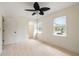 Bedroom features two windows, wood flooring and a spacious closet at 655 Swinton Ct, Mount Pleasant, SC 29464