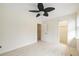 Bedroom with light wood floors, ceiling fan and access to the upstairs landing at 655 Swinton Ct, Mount Pleasant, SC 29464