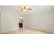 Empty bedroom with ensuite bathroom has light wood flooring and a ceiling fan at 655 Swinton Ct, Mount Pleasant, SC 29464