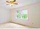 Bright bedroom featuring a ceiling fan and natural light streaming through the window at 655 Swinton Ct, Mount Pleasant, SC 29464