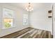 Spacious dining room featuring neutral walls, stylish flooring and bright windows at 655 Swinton Ct, Mount Pleasant, SC 29464