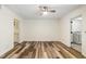 A roomy living area features updated flooring and easy access to the kitchen and laundry room at 655 Swinton Ct, Mount Pleasant, SC 29464