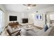 Inviting living room with fireplace, ceiling fan, and sliding door to the yard at 655 Swinton Ct, Mount Pleasant, SC 29464