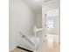 Staircase with wood steps and a white railing leading to the second floor at 655 Swinton Ct, Mount Pleasant, SC 29464