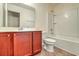 Bathroom featuring a vanity with dark wood cabinets, a toilet, and a shower-tub combination at 7675 High Maple Cir, North Charleston, SC 29418