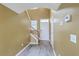 Entryway with stairs to the second floor and a front door with sidelight at 7675 High Maple Cir, North Charleston, SC 29418