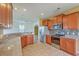Contemporary kitchen with stainless steel appliances, tile backsplash, and ample counter space at 7675 High Maple Cir, North Charleston, SC 29418