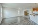 Open concept living area with lots of natural light and view into the kitchen at 7675 High Maple Cir, North Charleston, SC 29418