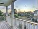 Picturesque balcony view showcasing a stunning bridge against a vibrant sunset backdrop at 828 Bridge Point Cir, Mount Pleasant, SC 29464