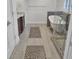 A luxurious bathroom features stylish tiling, a soaking tub, and a glass-enclosed shower at 828 Bridge Point Cir, Mount Pleasant, SC 29464