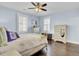 Cozy bedroom with hardwood floors, natural light, and decorative furnishings at 828 Bridge Point Cir, Mount Pleasant, SC 29464