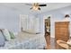 Comfortable bedroom with a ceiling fan, closet, and adjacent bathroom at 828 Bridge Point Cir, Mount Pleasant, SC 29464