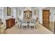 Elegant dining room with stylish chairs, chandelier, and a sophisticated ambiance at 828 Bridge Point Cir, Mount Pleasant, SC 29464