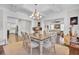 Inviting dining room with stylish decor open to the living room and kitchen at 828 Bridge Point Cir, Mount Pleasant, SC 29464