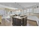 A stunning kitchen with stainless appliances, granite countertops, a gas stove, and a nearby breakfast nook at 828 Bridge Point Cir, Mount Pleasant, SC 29464