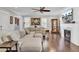 Bright and airy living room with a cozy fireplace and stylish decor at 828 Bridge Point Cir, Mount Pleasant, SC 29464