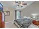 Bedroom with neutral walls, ceiling fan, and a comfortable bed at 851 Sandlake Dr # D, Mount Pleasant, SC 29464