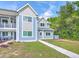 Exterior facade of this stylish two-story condo in cool blue at 851 Sandlake Dr # D, Mount Pleasant, SC 29464