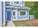 Front entrance to this two-story condo in cool blue at 851 Sandlake Dr # D, Mount Pleasant, SC 29464