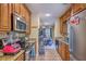 Galley kitchen featuring granite countertops and stainless steel appliances at 851 Sandlake Dr # D, Mount Pleasant, SC 29464