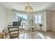 Bright home office with white desk, chair, natural light, and tile floors at 851 Sandlake Dr # D, Mount Pleasant, SC 29464