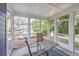 Screened porch with view of the pond and fountain at 851 Sandlake Dr # D, Mount Pleasant, SC 29464