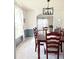 Classic dining room featuring a long wooden table and comfortable seating at 9229 N Moreto Cir, Summerville, SC 29485
