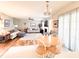 Open-concept living area showcasing a fireplace and comfortable seating at 9229 N Moreto Cir, Summerville, SC 29485