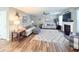 Spacious living area with fireplace, neutral tones, and comfortable seating at 9229 N Moreto Cir, Summerville, SC 29485