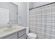 Bathroom features a toilet and shower with a shower curtain at 9712 Fanning Basket Ln, Ladson, SC 29456