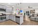 Modern kitchen featuring gray cabinets, granite countertops, and stainless steel appliances at 9712 Fanning Basket Ln, Ladson, SC 29456