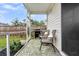 Screened in porch with grill, chairs, pillows, and view to backyard at 9712 Fanning Basket Ln, Ladson, SC 29456