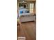 Comfortable bedroom featuring beautiful hard wood floors, bright natural light, and unique decor at 101 Fresh Meadow Ln, Mount Pleasant, SC 29466
