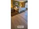 Bedroom 2 featuring a queen-sized bed, hardwood floors, and lots of natural light at 101 Fresh Meadow Ln, Mount Pleasant, SC 29466