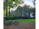 Well maintained home featuring a lush green lawn and mature landscaping at 101 Fresh Meadow Ln, Mount Pleasant, SC 29466