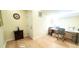 Brightly lit rec room featuring wood flooring, office space and exterior access at 101 Fresh Meadow Ln, Mount Pleasant, SC 29466